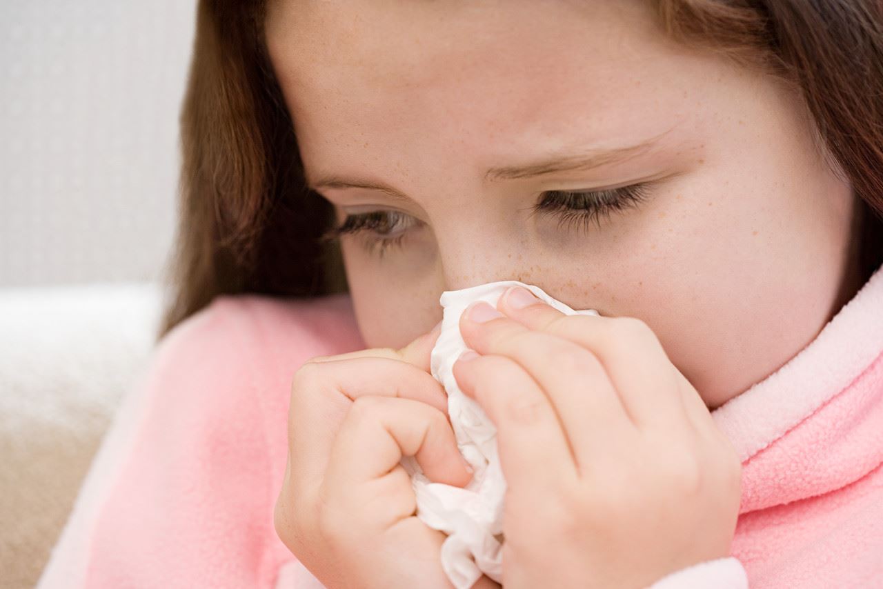 Child Blowing Nose